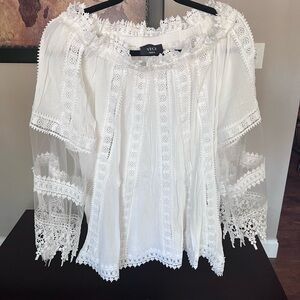 Beautiful bohemian style top by Vici. Size small.